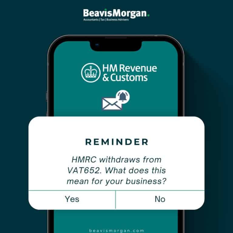 Notification message with title of this article. HMRC on the mobile background.